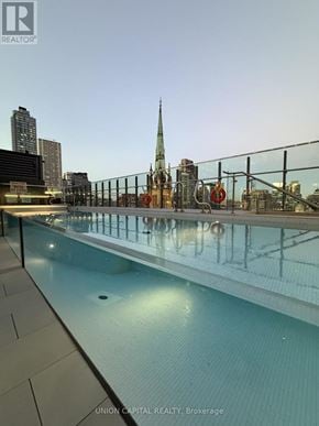 Toronto (Church-Yonge Corridor) condo for rent - A pool with a cityscape in the background.
