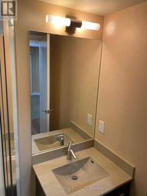 Toronto (Agincourt South-Malvern West) condo for rent - A bathroom with a sink and mirror.