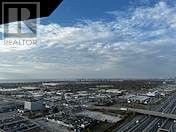 Toronto (Islington-City Centre West) condo for rent - A realtor logo is superimposed on a cityscape.