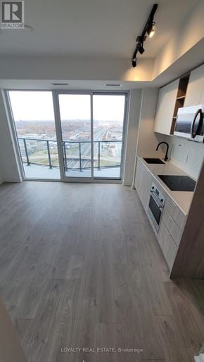 Toronto (Islington-City Centre West) condo for rent - A kitchen with a view of the city.