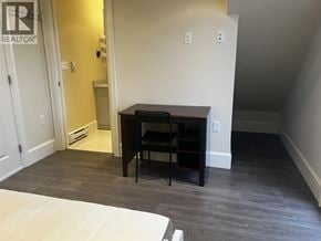 Vancouver apartment for rent - A room with a desk and a chair.