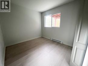Maple Ridge apartment for rent - A room with a window and a door.