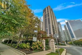 Toronto (Lansing-Westgate) condo for rent - A street view with a tall building and a sign that says "HomeBayview Realty Inc Brokerage".