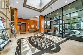 Toronto (Lansing-Westgate) condo for rent - A real estate office lobby with a black and white checkered floor.