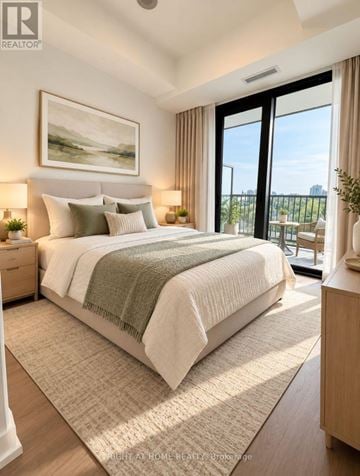 Toronto (Forest Hill South) condo for rent - A bedroom with a large bed and a view of the city.