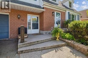 Hamilton apartment for rent - A house with a blue door and a mailbox on the left.
