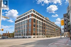 Kitchener condo for rent - A large building with the words "King St." on the front.