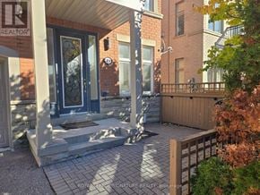 Vaughan (East Woodbridge) townhouse for rent - A Royal LePage Signature Realty Brokerage sign is on a house.