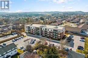 Lincoln (Lincoln-Jordan/Vineland) condo for rent - A large apartment complex with a parking lot in front.