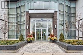 Toronto (Mimico) condo for rent - The front of a building with the sign "80 Marine Parade Dr." on it.