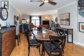 Huntsville townhouse for rent - A dining room with a wooden table and chairs.