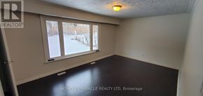 Pickering (Rosebank) apartment for rent - A room with a view of a snowy landscape through the window.