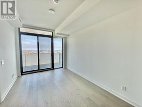 Toronto (Church-Yonge Corridor) condo for rent - A room with a sliding glass door leading to a balcony.