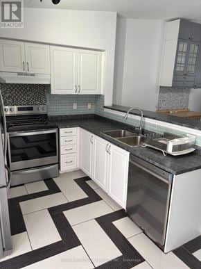 Milton (De Dempsey) condo for rent - A modern kitchen with black and white tiles.