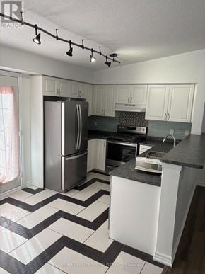Milton (De Dempsey) condo for rent - A kitchen with a black and white checkered floor.