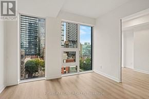 Toronto (Church-Yonge Corridor) condo for rent - A room with a view of the city through the windows.