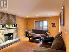 Richmond Hill (Bayview Hill) apartment for rent - A living room with a fireplace and a couch.