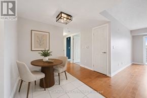 Centre Wellington (Fergus) condo for rent - A dining room with a round table and chairs.