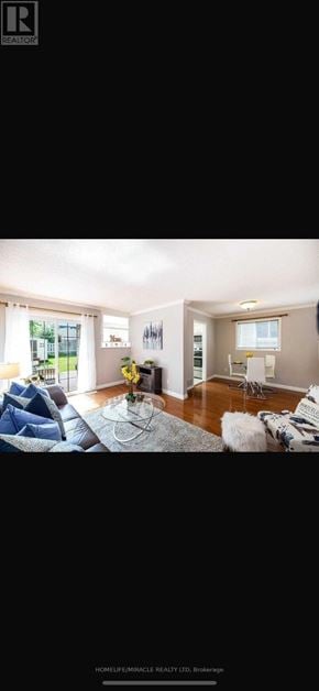 Oshawa (Mclaughlin) apartment for rent - A living room with a couch and a coffee table.