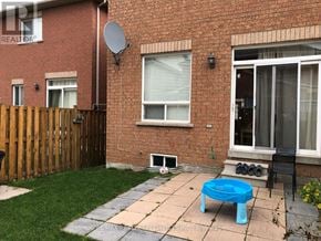 Brampton (Madoc) apartment for rent - A red brick house with a satellite dish on the roof.