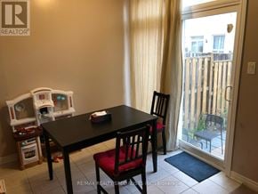 Brampton (Madoc) apartment for rent - A dining room with a table and chairs.