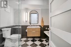 Toronto (Palmerston-Little Italy) condo for rent - A bathroom with a black and white checkered floor.