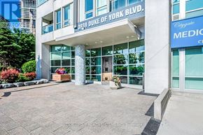 Mississauga (City Centre) condo for rent - The Duke of York Blvd building has a blue sign on the right side.