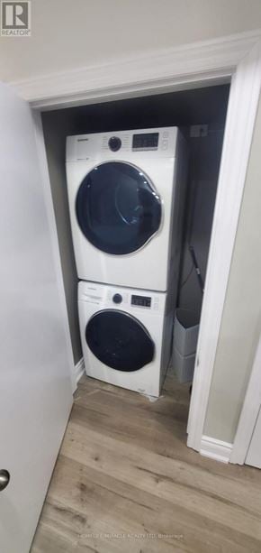 Brampton (Bram East) apartment for rent - A white washing machine is in a small space.