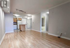 Mississauga (City Centre) condo for rent - A realtor's office with wood flooring and white walls.