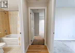 Mississauga (City Centre) condo for rent - A bathroom with a toilet, tub, and sink.