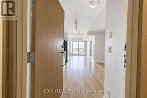 Pickering (Bay Ridges) condo for rent - A hallway with wooden doors and a white ceiling.
