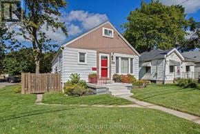 London East (East C) apartment for rent - A small house with a red door is for sale.