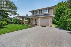 Kitchener apartment for rent - A house with a garage is for sale.
