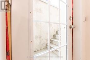 Milton (Fo Ford) apartment for rent - A white door with a glass window and a white door handle.