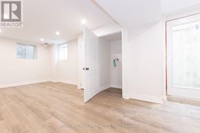 Milton (Fo Ford) apartment for rent - A room with a door and a window.