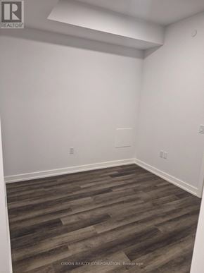 Vaughan (Vaughan Corporate Centre) condo for rent - A room with wooden flooring and white walls.