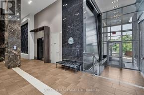 Ottawa condo for rent - A hallway with a marble floor and a bench.