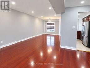 Brampton (Fletcher's West) apartment for rent - A room with wooden flooring and a window with blinds.