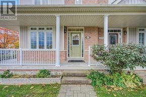 Markham (Cornell) apartment for rent - A house with a front porch and a green door.