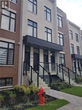 Vaughan (Sonoma Heights) townhouse for rent - A building with a red fire hydrant in front of it.
