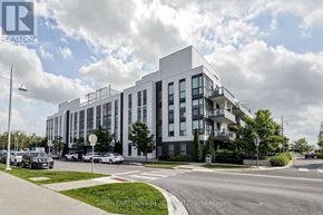 Innisfil condo for rent - A modern multi-story building with a glass facade is the main focus of the image.