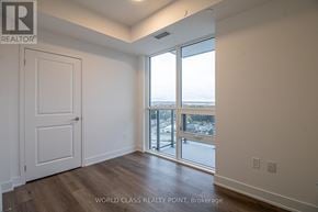 Milton (Om Old Milton) condo for rent - A room with a door and a window with a view of the street.