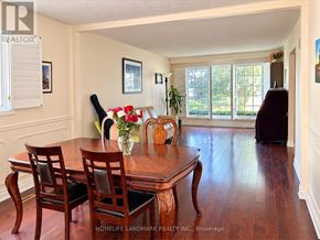 Toronto (Banbury-Don Mills) apartment for rent - A dining room with a table set for two and a view of the backyard.