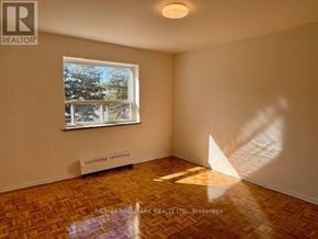 Mississauga (Cooksville) house for rent - A room with a window and a radiator on the floor.
