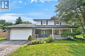 Hamilton (Freelton) apartment for rent - A house with a white garage door and a grey roof.