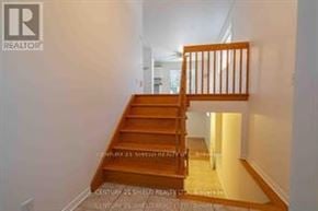 South Glengarry apartment for rent - A wooden staircase in a house.