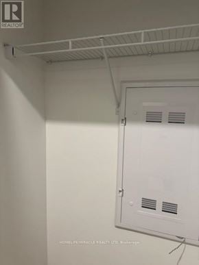 Mississauga (Mississauga Valleys) house for rent - A white wall with a white ventilation unit and a white shelf above it.