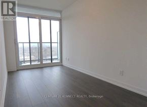 Toronto (Mount Pleasant West) condo for rent - A room with a large window and a sliding glass door.