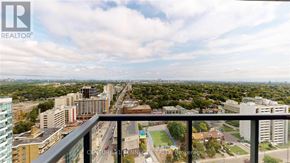 Toronto (Mount Pleasant West) condo for rent - A cityscape viewed from a high balcony.