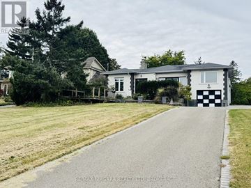 Fort Erie (Central) apartment for rent - A house with a black and white checkered gate in front of it.